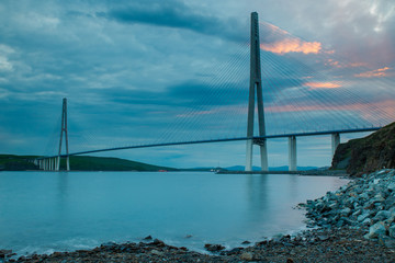 Evening view of long cable-stayed bridge in Vladivostok, Russia