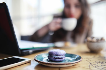 Girl eating coffee cakes