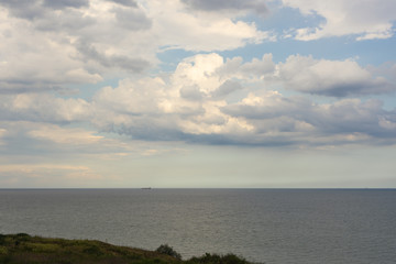 Storm clouds over the sea and the city.