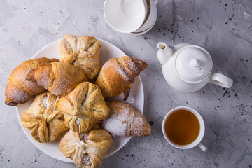 Baking puff pastry with a sweet filling for tea or lunch concept