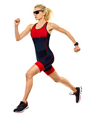 one caucasian woman practicing triathlon triathlete ironman runner running jogger jogging in studio...