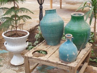 Fototapeta na wymiar blue and green pottery ceramic vases on table