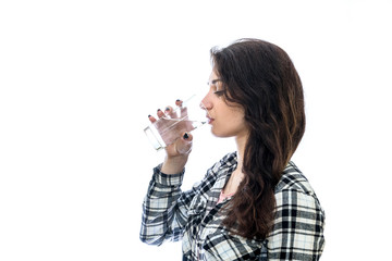 Woman drinking water from glass isolated on white