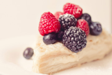 millefeuille cake with fresh blackberries and raspberries