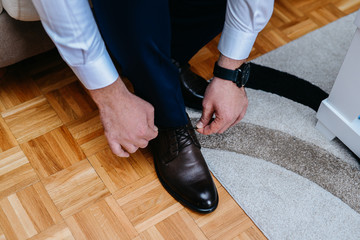 A businessman prepares for a meeting with a client