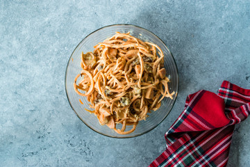 Spiralized Raw Sweet Potato Salad with Tahini / Tahin Sauce, Walnut and Cheese in Glass Bow.l.