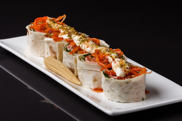 Rolls with pita and ham on white plate