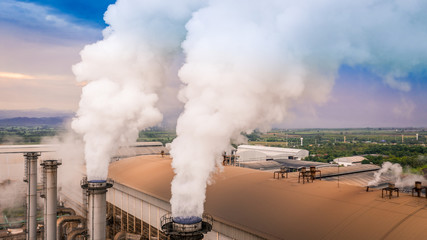 Smokestack pipe factory pollution in the city, Fuel Power Plant Smokestacks Emit Carbon Dioxide...