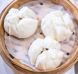 Delicious dim sum, famous cantonese food in asia - Fresh and hot Cha Siu Bao, BBQ pork bun in...