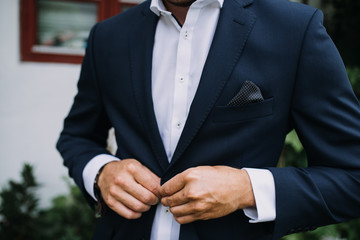 A businessman prepares for a meeting with a client