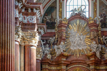 baroque interior of the Parish Church "Poznanska Fara". Column details. Poznań, Poland. © Szymon