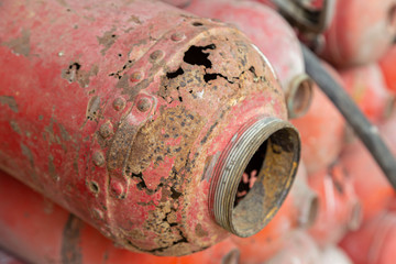 The Fire extinguisher is damaged.