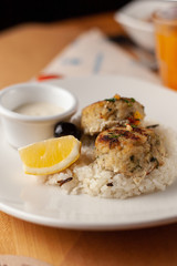 Cutlets with steamed rice on a white dish for a nutritious lunch out