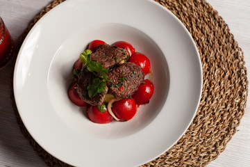 Top view of mini steaks with mashed potatoes and onion, served on white background