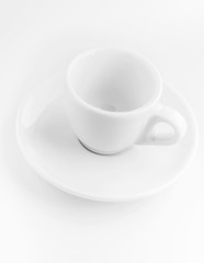 white coffee cup and saucer, empty coffee-free coffee cup, top side view, or black coffee, on a white background