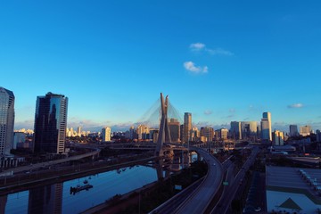 Naklejka premium Aerial view of sunset in Sao Paulo city, Brazil. Great sunset scene. Fantastic landscape. Business city. 