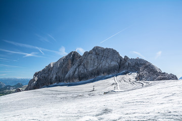 Mountain tops overlooking glacier in Dachstein, Austria