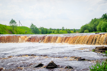 Sablinsky waterfalls. Little waterfall. The brown water of the waterfall.. Thresholds on the river....