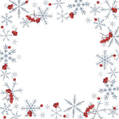 Christmas frame with snowflakes and rowan berries.