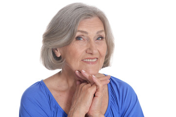 Portrait of beautiful senior woman posing on white background