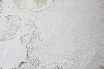 The grunge white concrete old texture wall