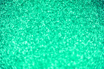 Obraz premium Bright sparkle aquamarine background. Holiday and festive concept.