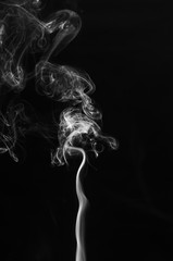 abstract fragment movement of white smoke on black background.