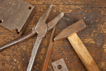 Collection of vintage carpentry tools on an old workbench: woodworking, craftsmanship and handwork concept