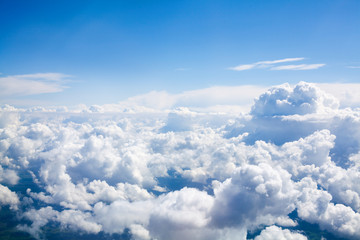 White clouds on blue sky background close up, cumulus clouds high in azure skies, beautiful aerial...