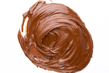 Chocolate cream isolated on white background. Flat lay.