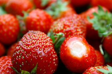 Background of red ripe strawberries. Summer ripe berries, closeup.