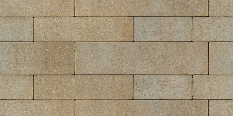 The surface is paved with road tiles of different sizes (multiformat). The uneven (melange) color...