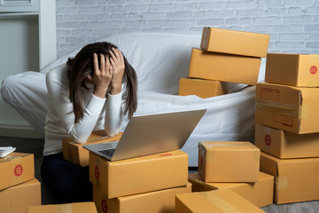 Young Asian women shop online  are stressed . After customers claim products