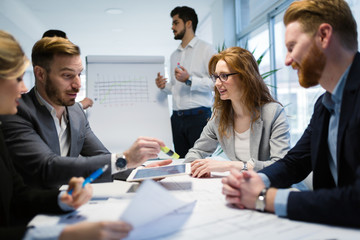 Business colleagues collaborating and discussing project plans