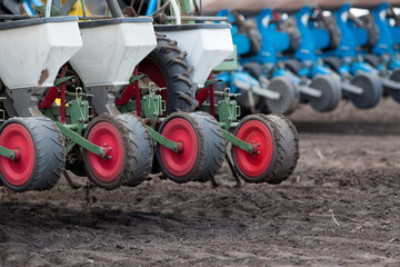 Tractor with seeder in sowing season