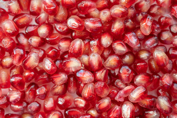 Fresh ripe pomegranate. Macro with shallow depth of field.
