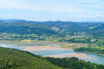 Naklejka na ściany i meble panoramic view of urdaibai estuary at basque country coast