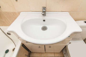 The photo of a sink in a bathroom