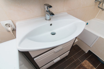 The photo of a sink in a bathroom