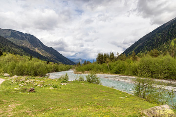 Fototapeta na wymiar Mountain landscape in the valley of the river Arkhyz