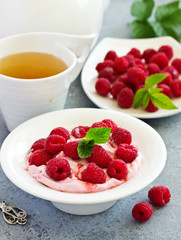 Creamy curd mousse with raspberries. Healthy breakfast.