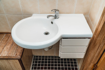 The photo of a sink in a bathroom