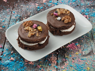 Chocolate cake sprinkled with nuts