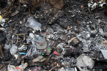 burning trash garbage combustion can cause air pollution photo