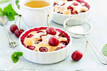 Cherry clafoutis - traditional French sweet fruit dessert.