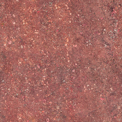 The soil under the feet is red with a textured surface.Texture or background