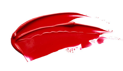 Red lipstick or acrylic paint isolated on white