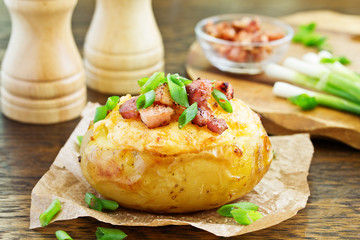 Stuffed baked potatoes with cheese and bacon.