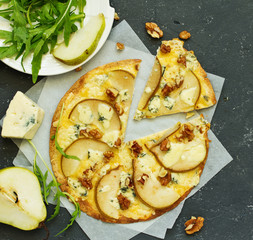 Dietary pizza tortilla with pears and cheese Dor Blue.