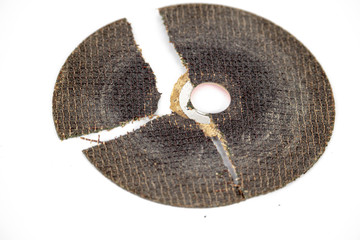 dangerous broken cracked cutting wheels abrasive safety work disc isolated white background photo close up